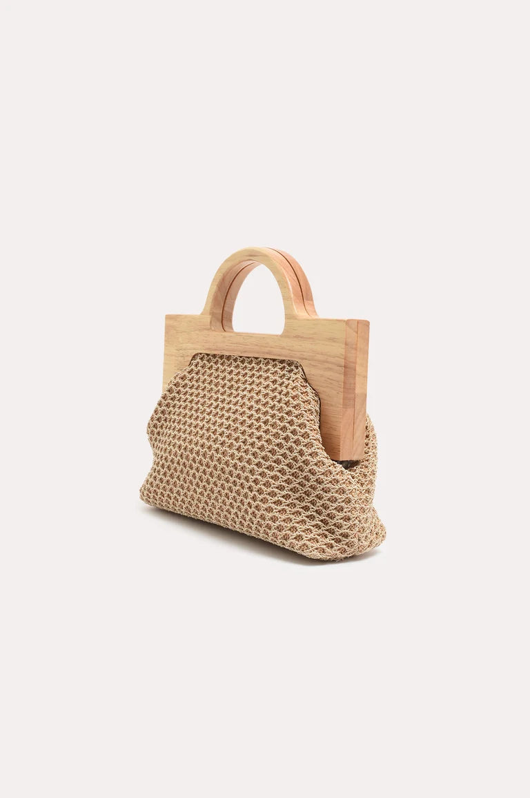 Image of Adorne small structured handbag with a light natural wood frame and top handle, combined with a woven beige textured front panel, shown on a plain light gray background.