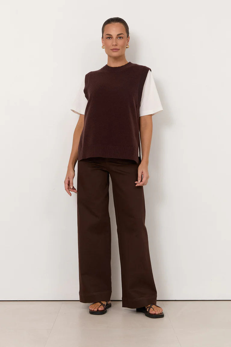 Image of Woman wearing a Adorne brown sleeveless top and wide-leg pants against a white background