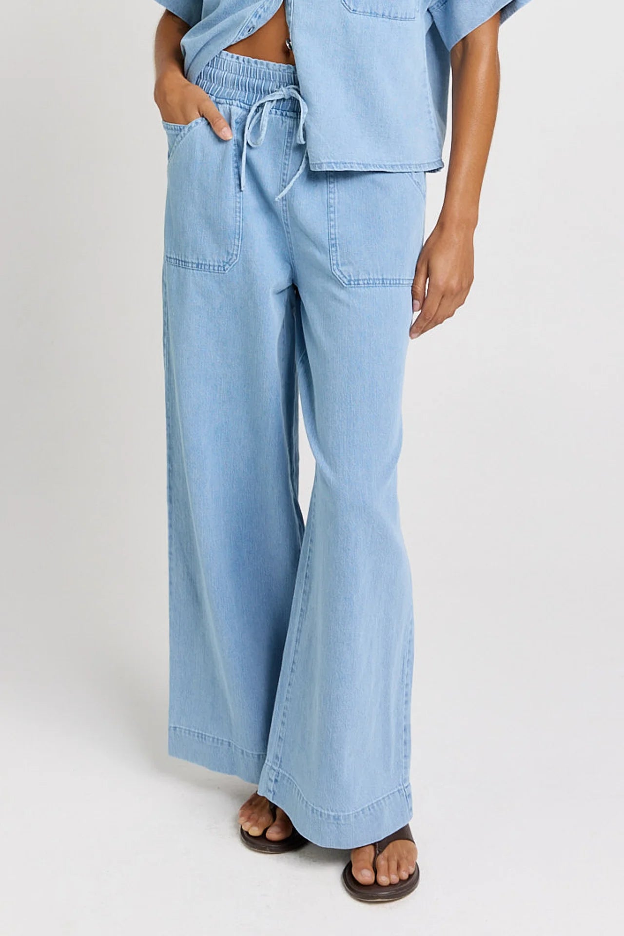 Image of Betty Basics light blue outfit with wide-leg pants on a plain background