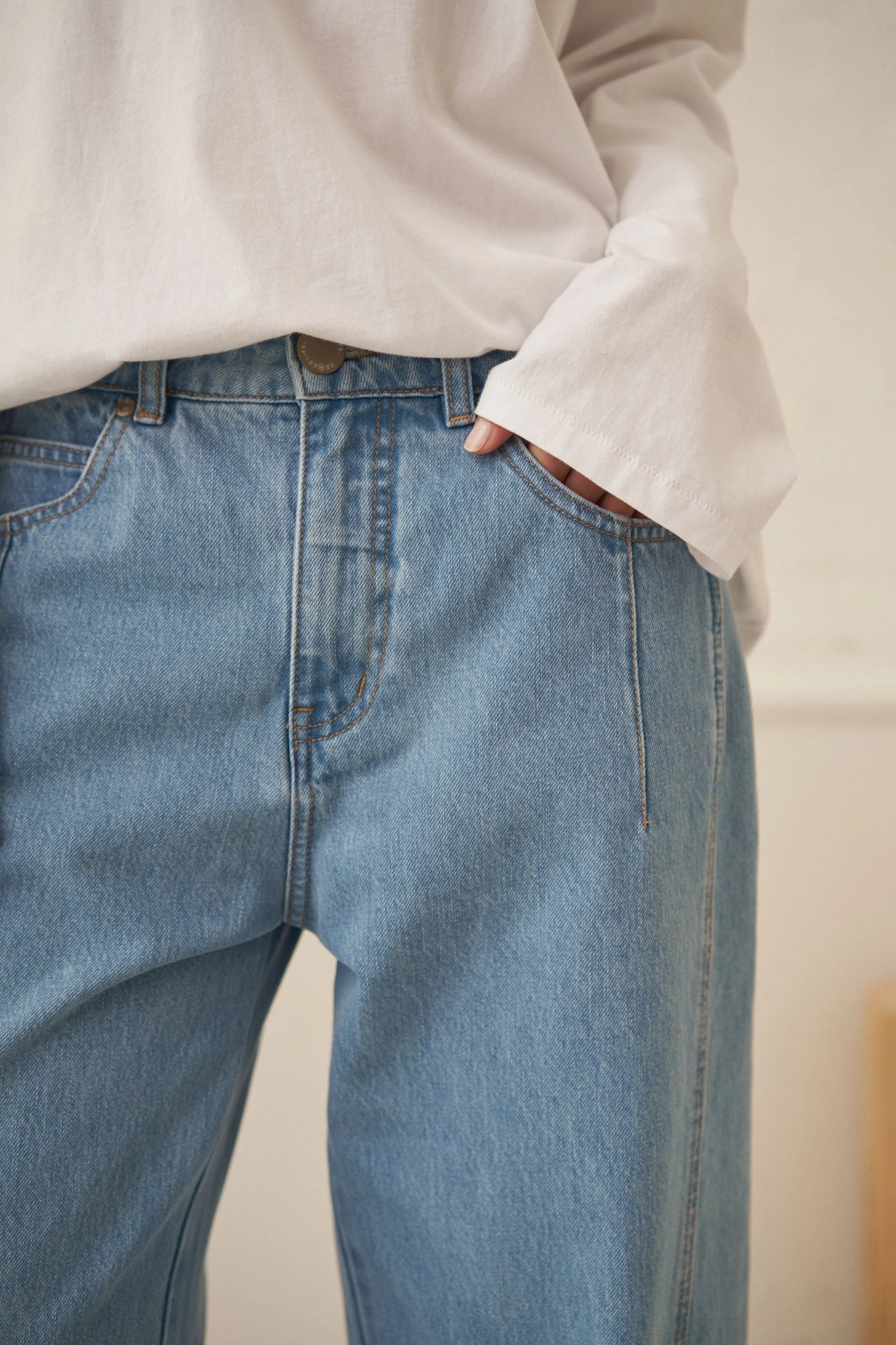 Image of Ceres Life Demi Barrel Jeans in Vintage Blue, featuring a high-waisted silhouette, relaxed curved barrel legs, classic button and zip fastening, front pockets and a cropped ankle-length finish.
