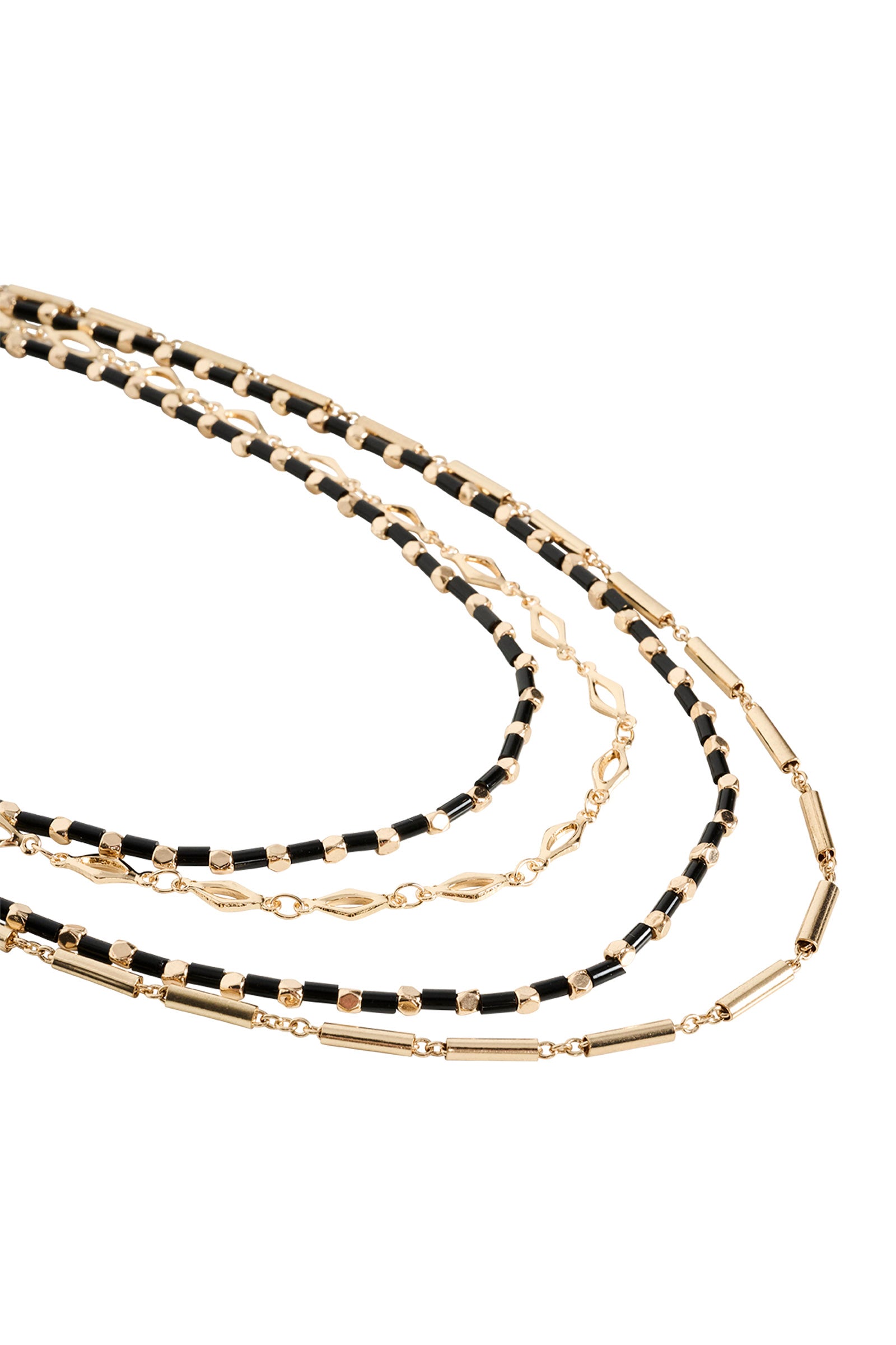 Eb & Ive Set of three layered necklaces with gold and black beads on a white background
