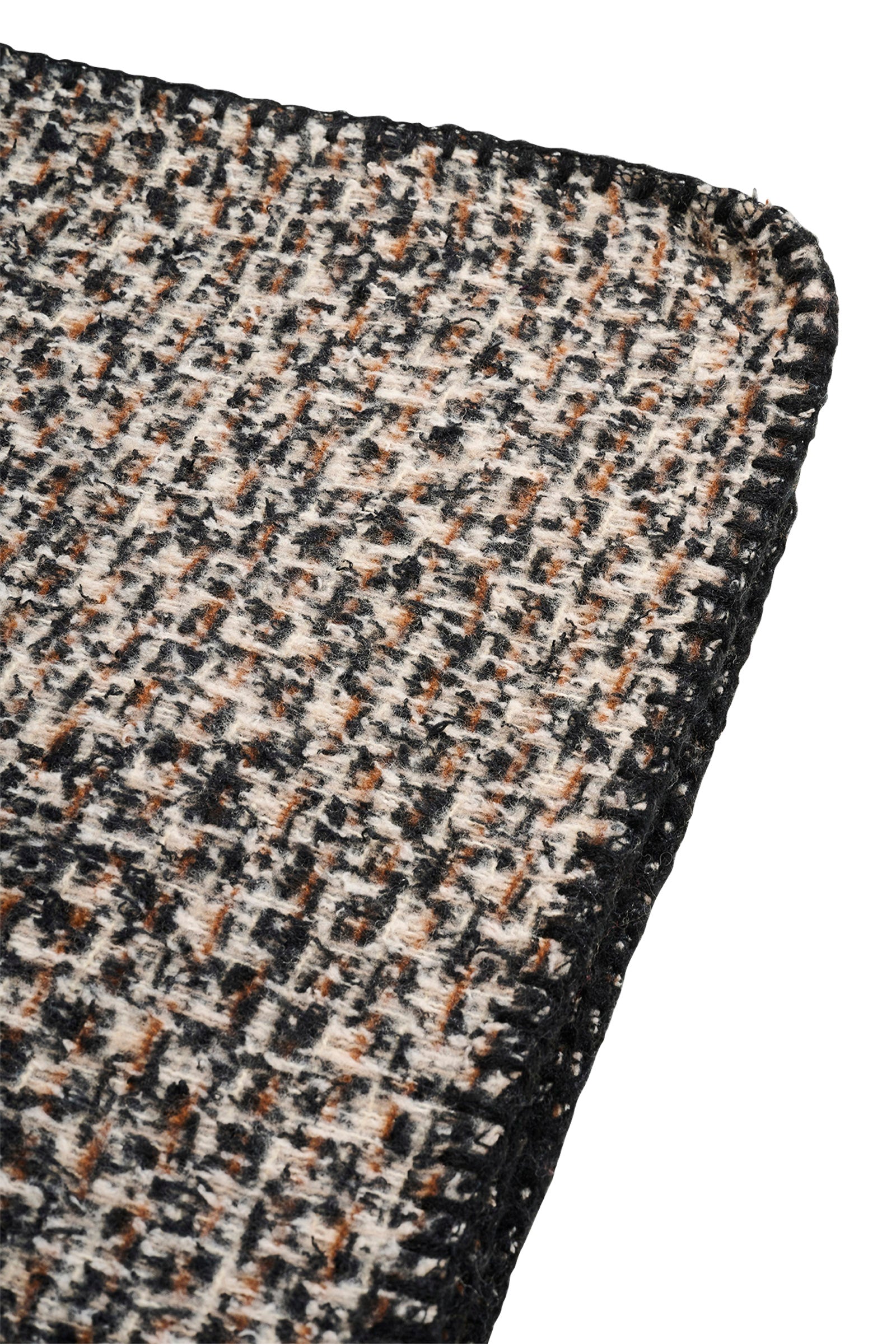 Image of Close-up of a Eb & Ive textured scarf with a checkered pattern on a white background