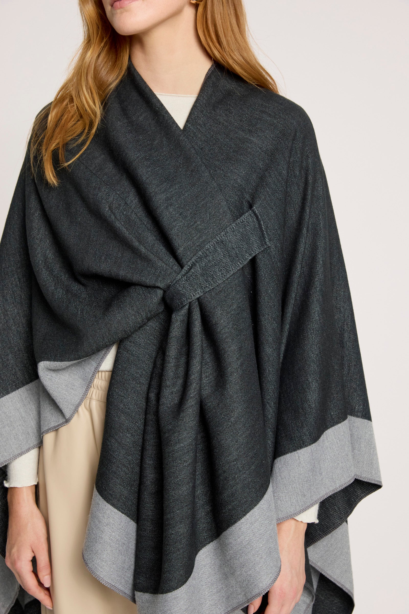 Image of Eb and Ive Dark gray wrap worn by a person on a light background