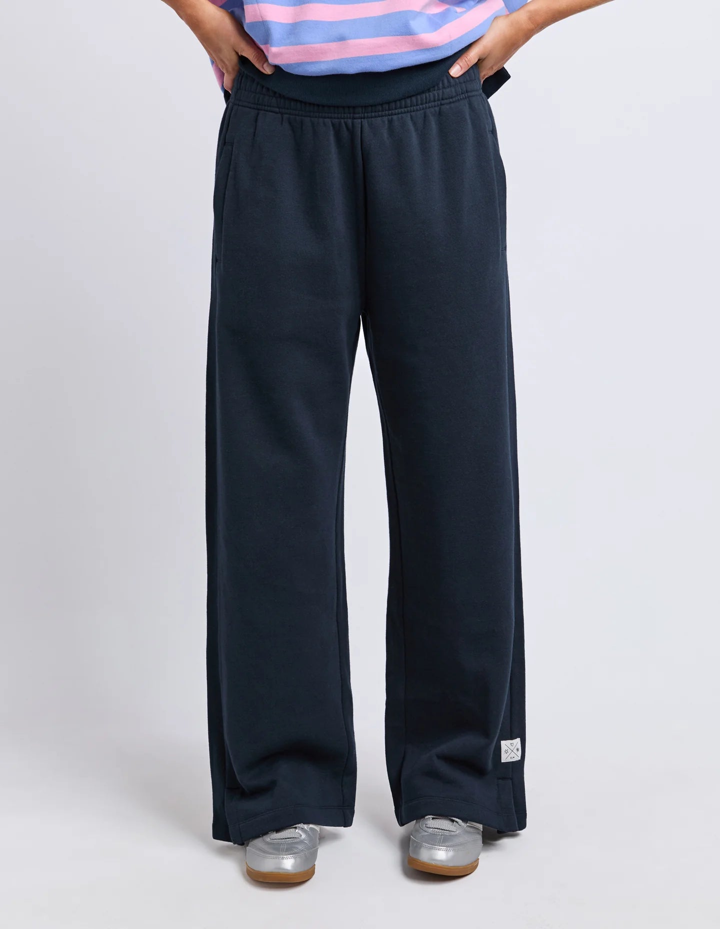 Elm Navy wide-leg pants worn by a person on a white background