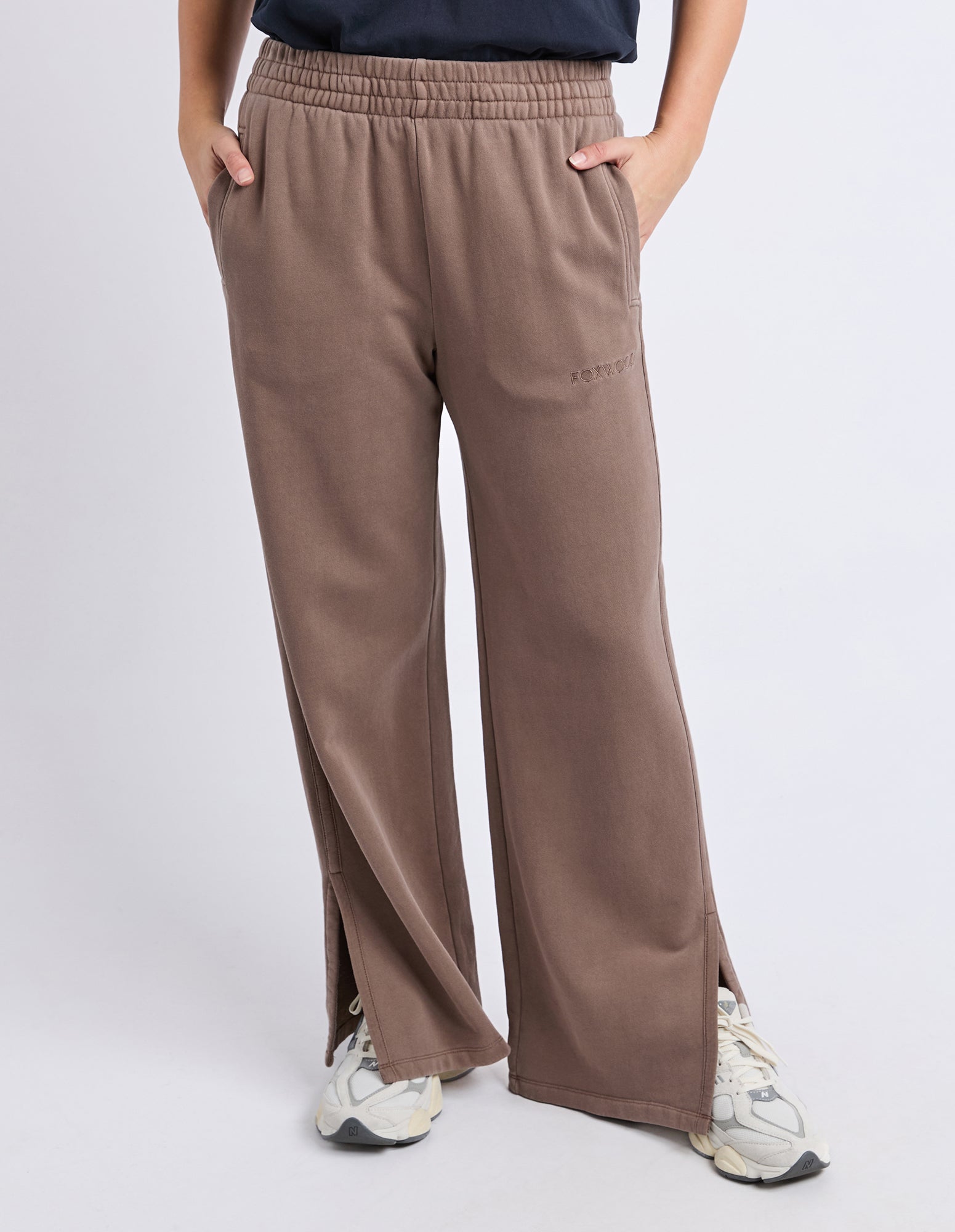 Image of Foxwood Brown wide-leg pants worn by a person on a light gray background