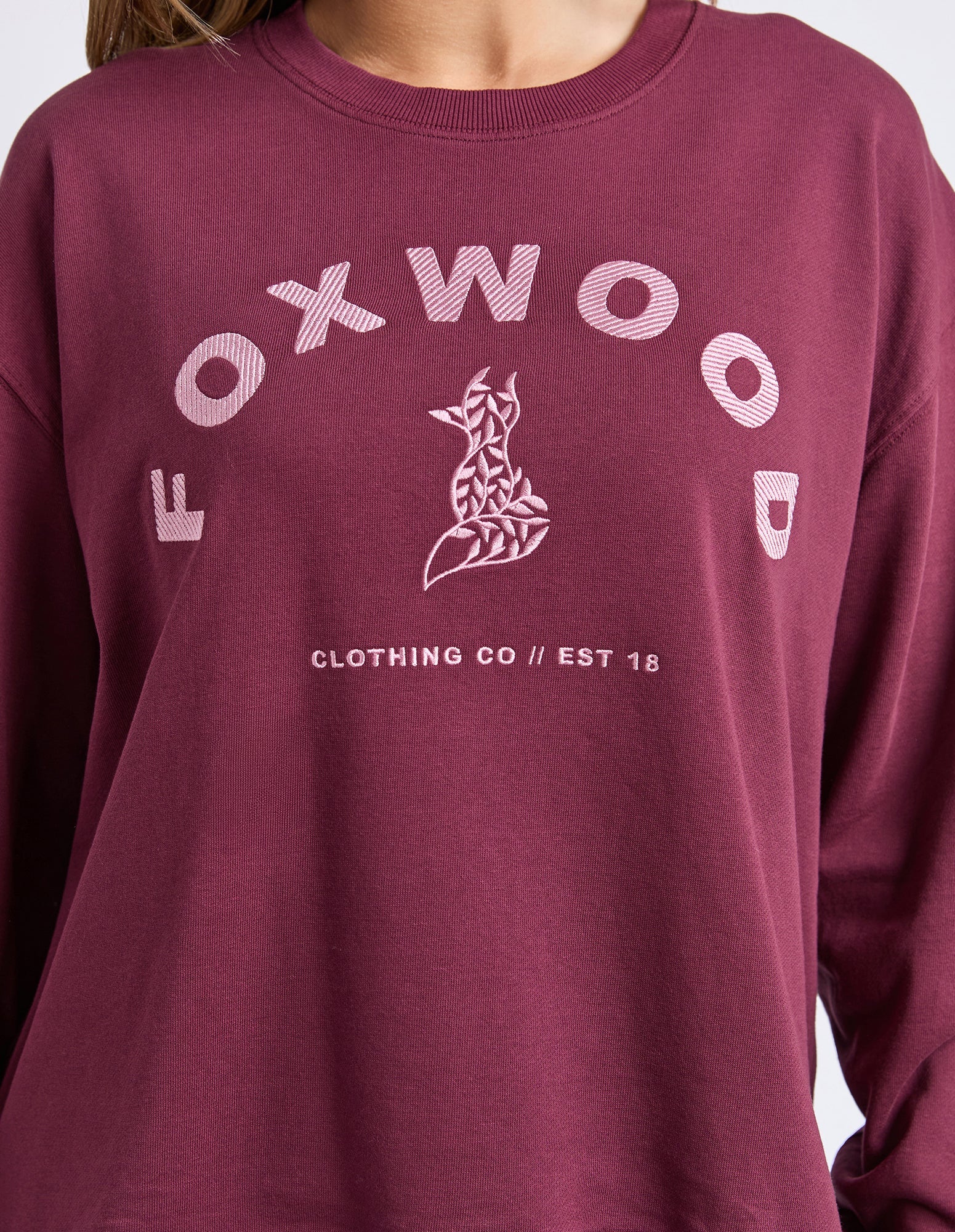 Image of Foxwood Maroon sweatshirt with 'FOXWOOD CLOTHING CO' logo on a white background