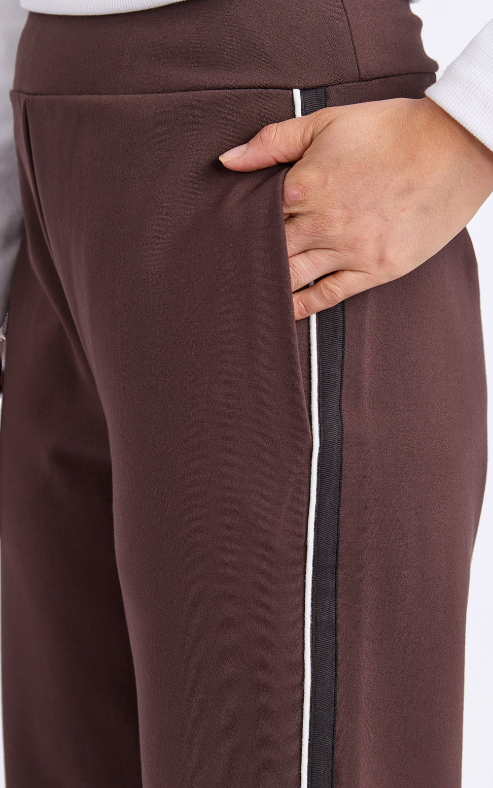 Foxwood brown pants with a white stripe on a plain background