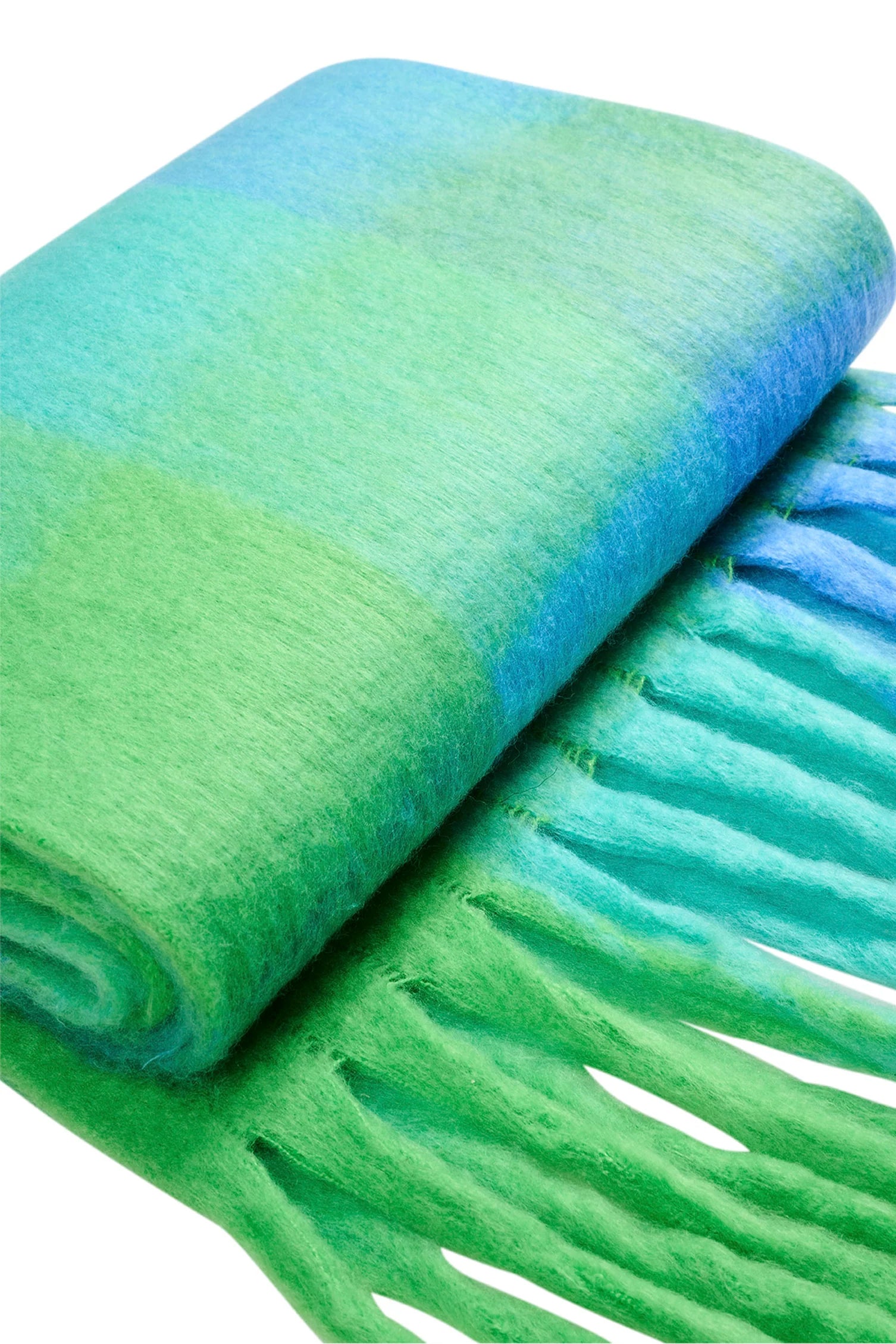 Image of Haven green and blue gradient scarf with fringes on a white background