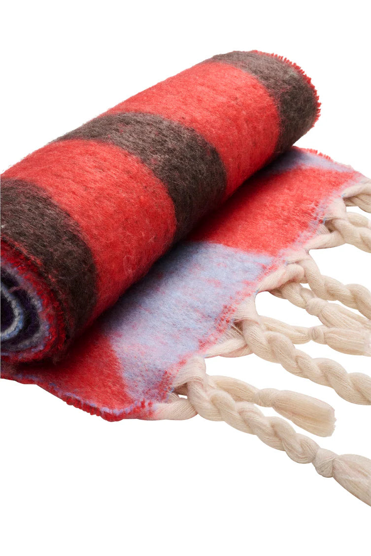 Haven Valenza Triangle scarf in red pictured on a white background