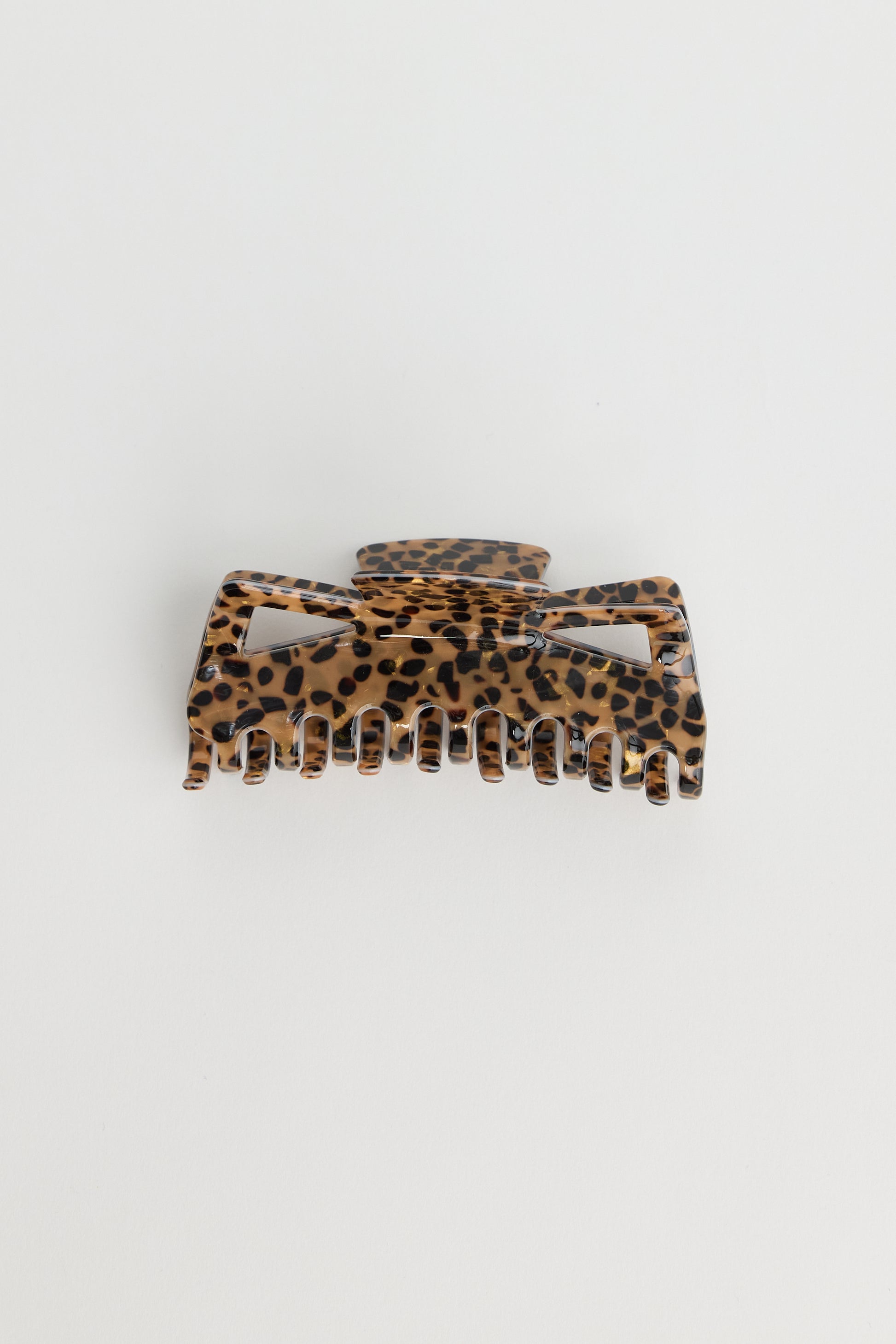 Holiday Life Leopard print hair clip on a white background