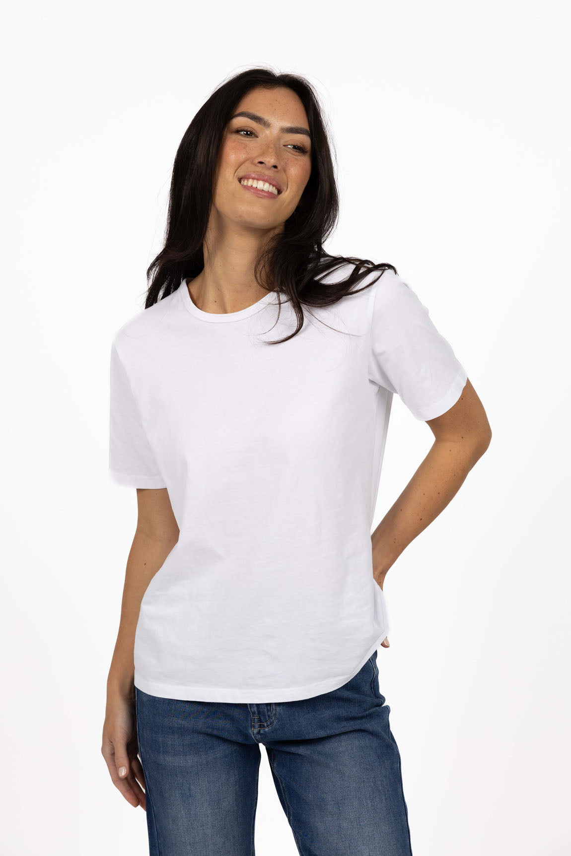 Image of Woman wearing a Humidity plain white t-shirt and blue jeans on a white background