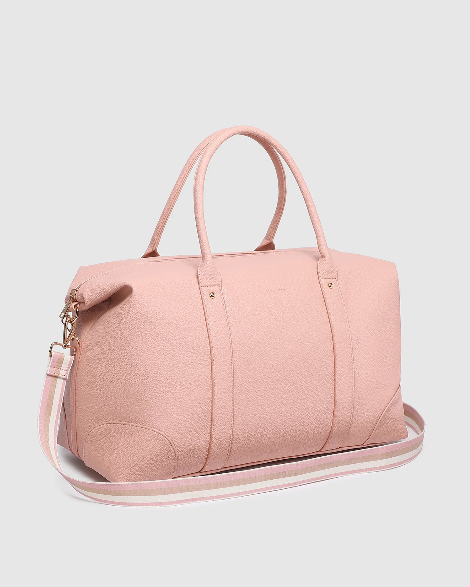 Image of Louenhide Alexis Weekender Travel Bag in Blush Stripe is the perfect companion for weekend getaways and effortless travel. Featuring a soft blush striped design