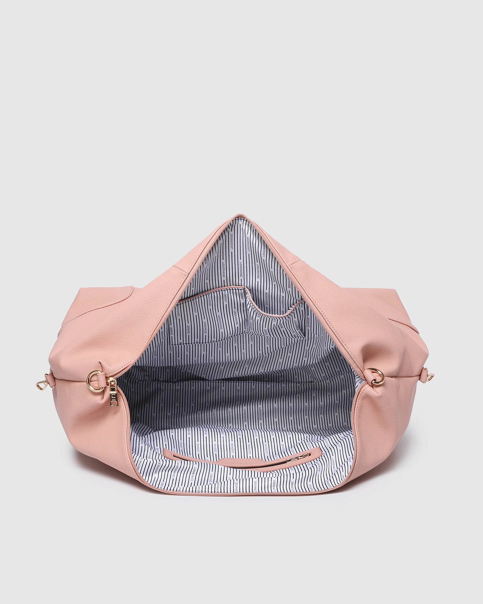 Image of Louenhide Alexis Weekender Travel Bag in Blush Stripe is the perfect companion for weekend getaways and effortless travel. Featuring a soft blush striped design