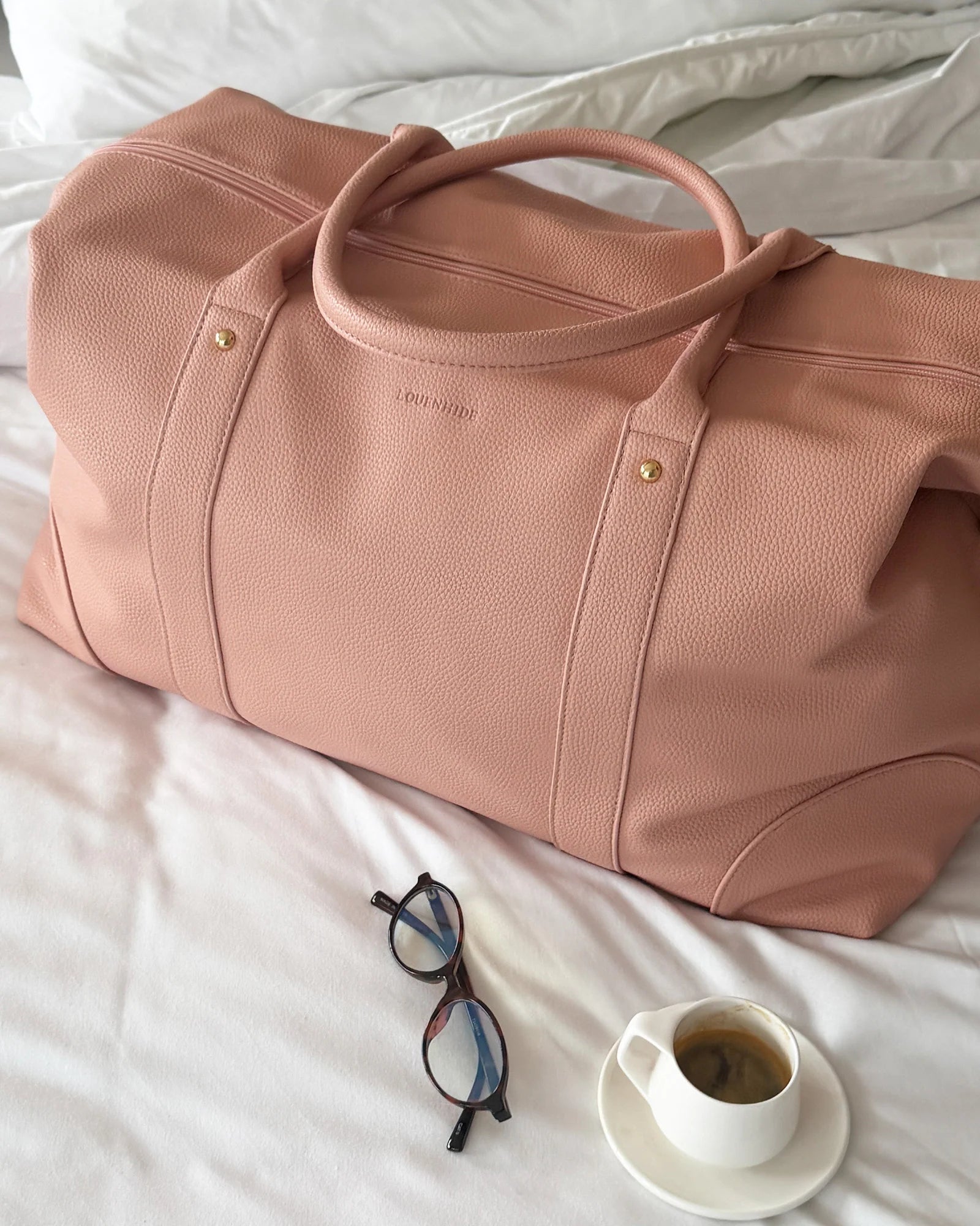 Image of Louenhide Alexis Weekender Travel Bag in Blush Stripe is the perfect companion for weekend getaways and effortless travel. Featuring a soft blush striped design