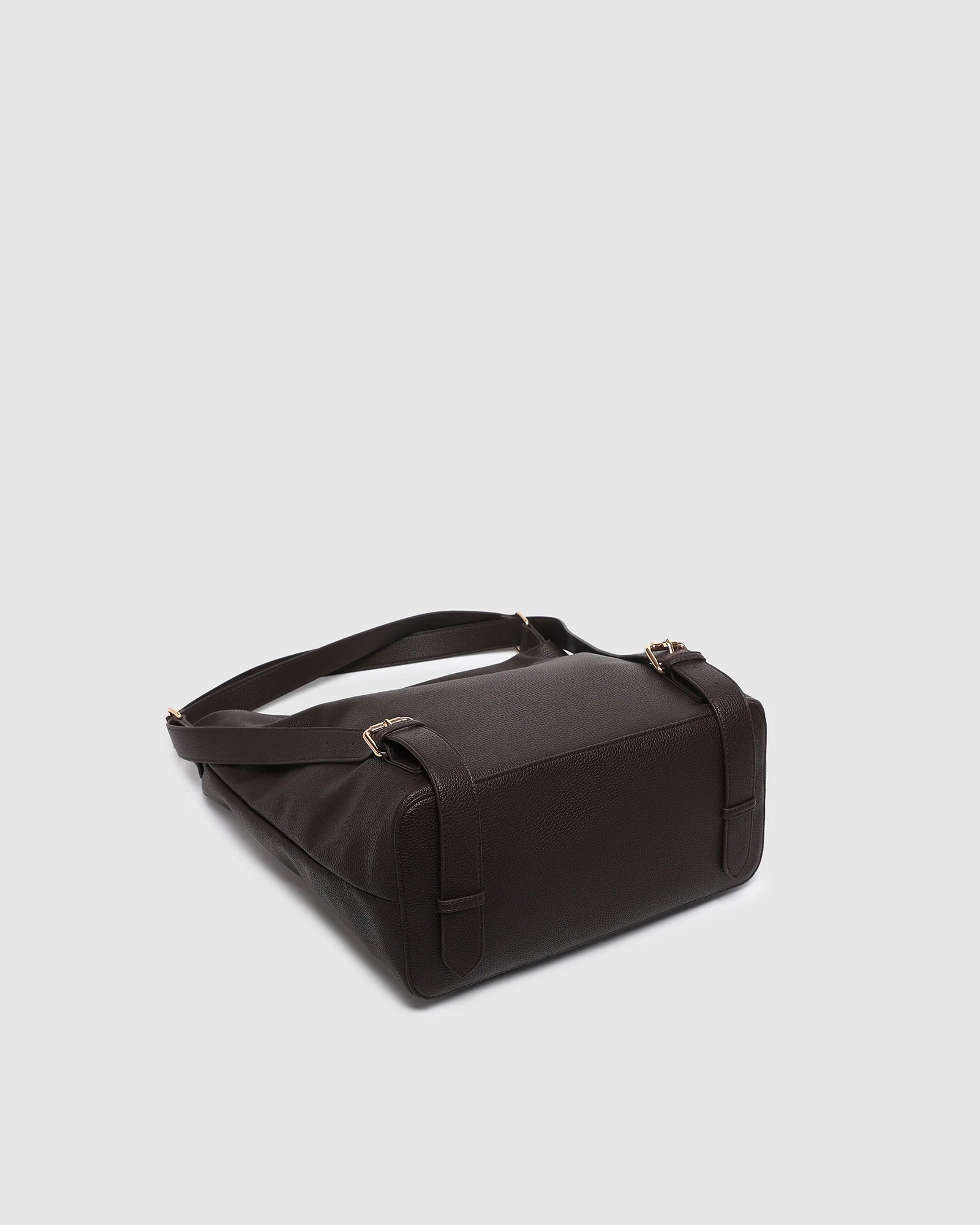 Image of Louenhide brown leather bag on a light gray background