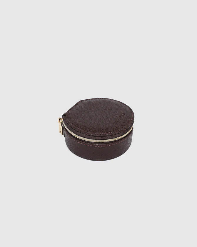 Collection of Louenhide Brown leather jewelry case with gold zipper on a light gray background in a gallery layout