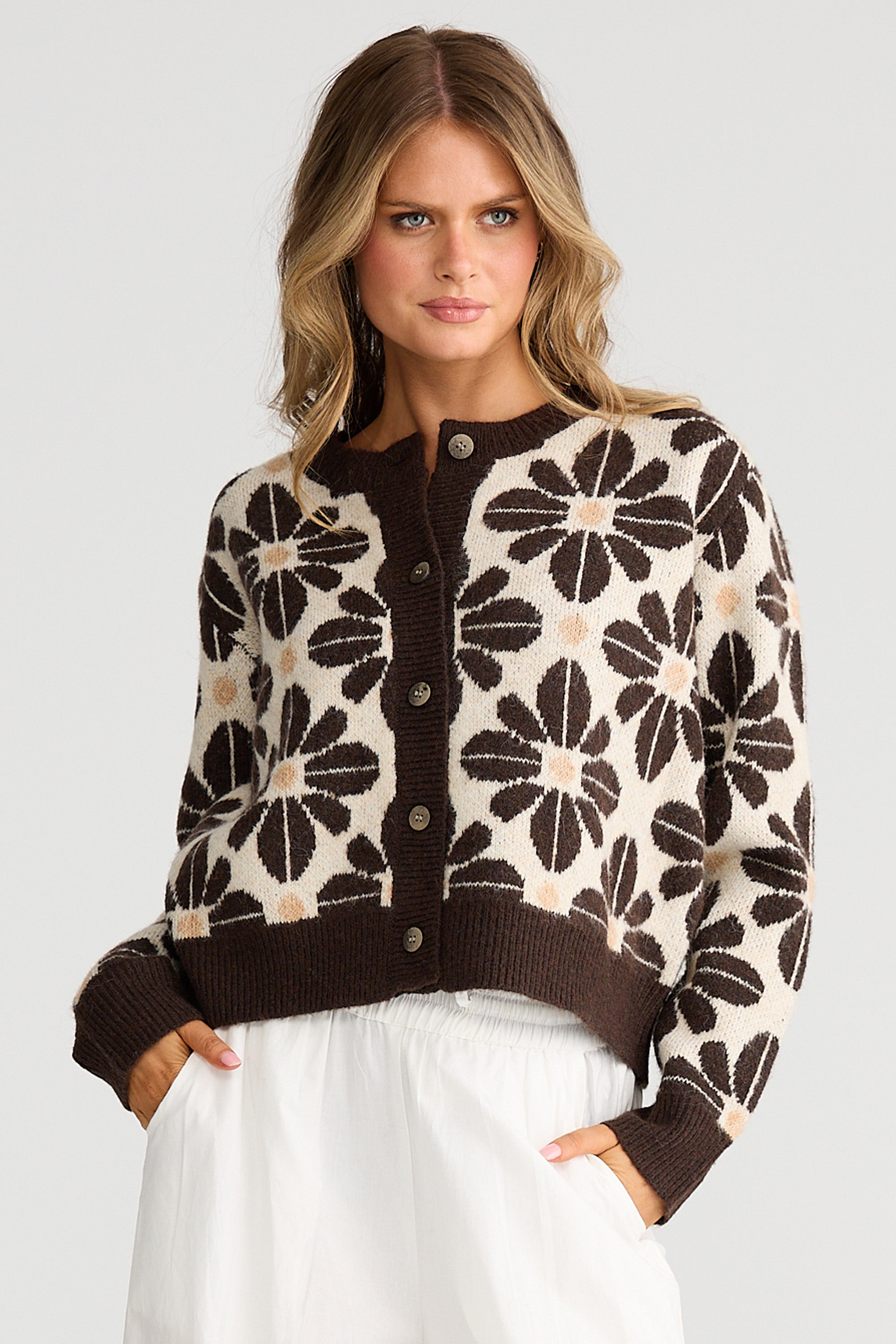 Collection of Woman wearing Talisman Tesselate cardi with bold print  in a gallery layout