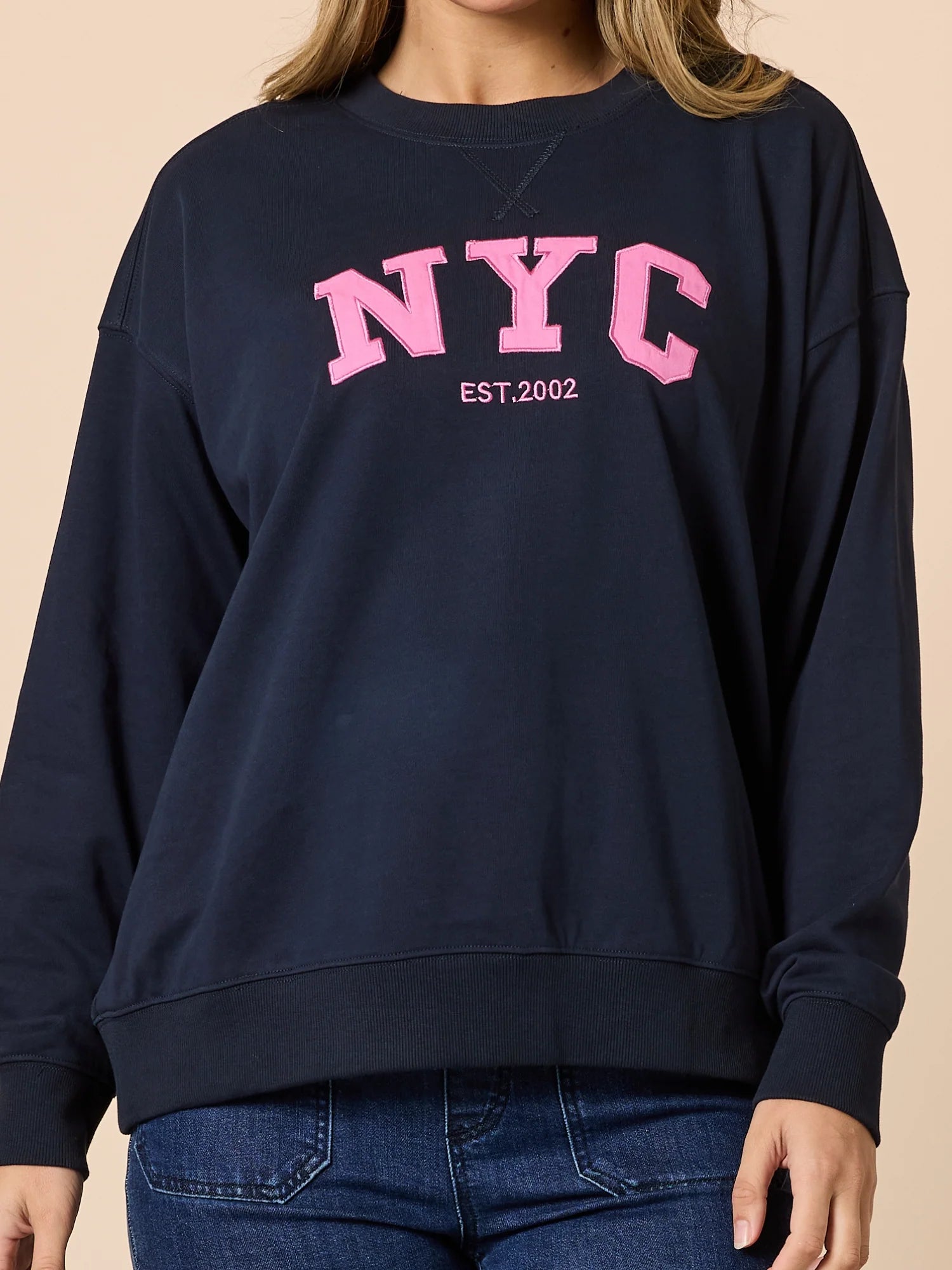 Woman wearing Threadz NYC crewneck 